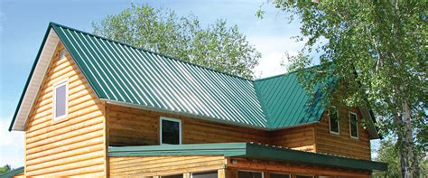 red house with green metal roof|red galvanized metal roof.